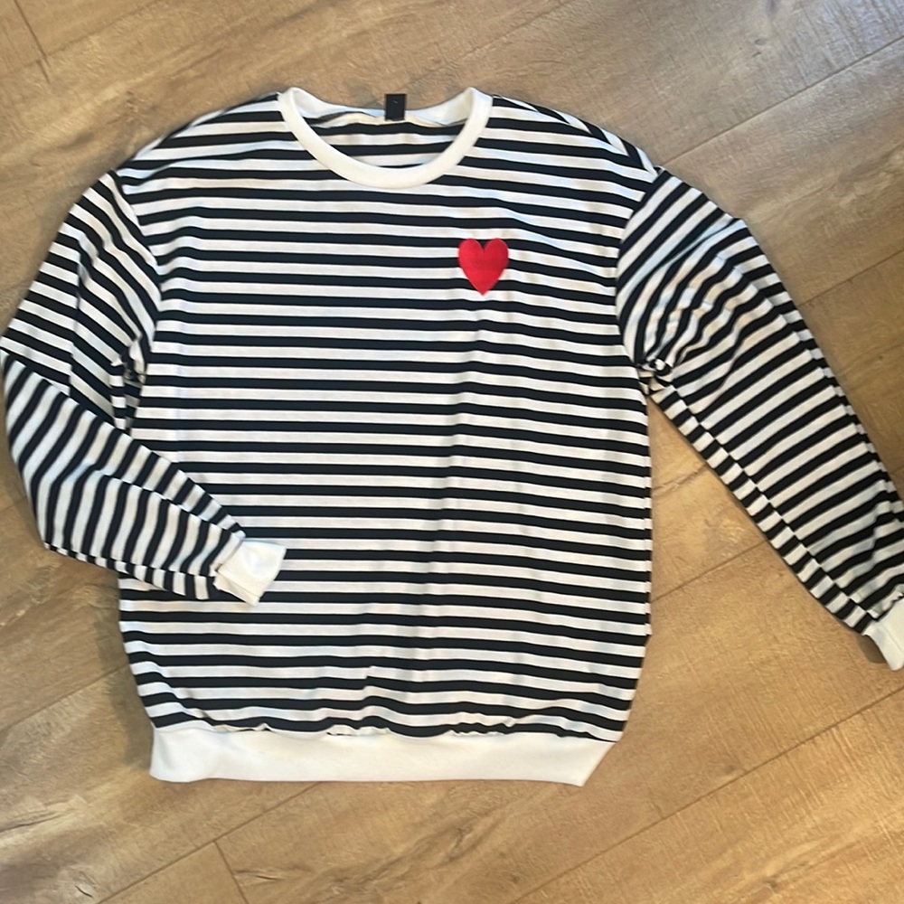 Long sleeve, black and white striped T-shirt with red heart